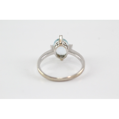 55 - 9ct gold topaz diamond ring (2.7g) Size O