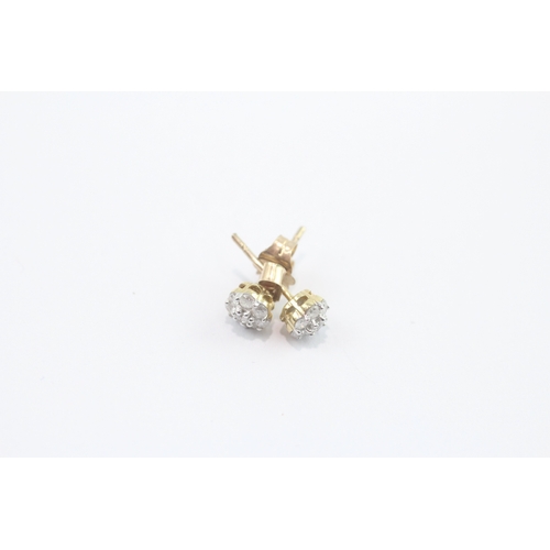 60 - 9ct gold diamond cluster earrings and pendant set (1.4g)