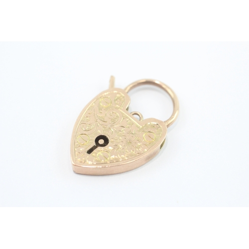 8 - 9ct gold foliage patterned padlock (3.8g)