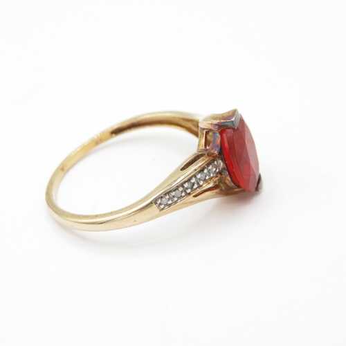12 - 9ct Gold Garnet and Diamond Twist Ring (2.4g) Size R