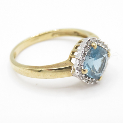 22 - 9ct Gold Topaz and Diamond Halo Ring (2.1g) Size L