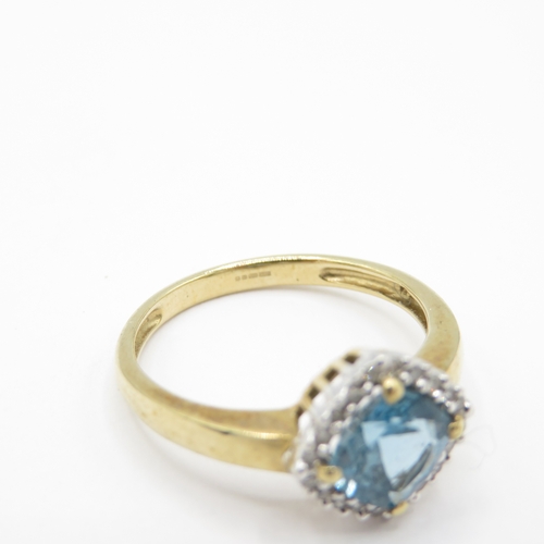 22 - 9ct Gold Topaz and Diamond Halo Ring (2.1g) Size L