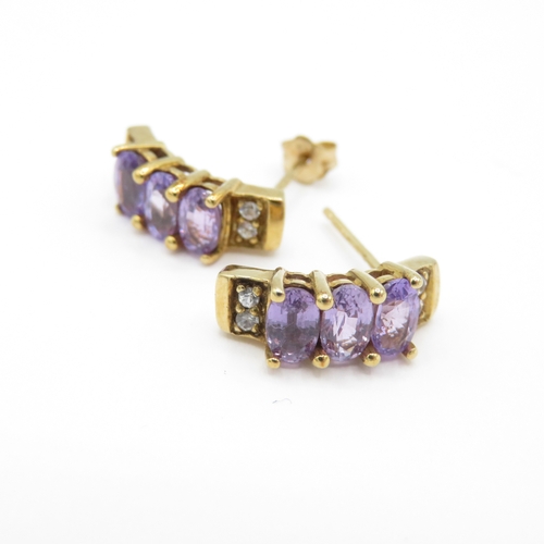 29 - 2 x 9ct Gold Purple Sapphire and White Zircon & Amethyst and Diamond Floral Stud Earrings (3.5g)