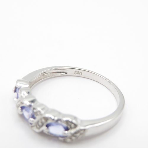 31 - 9ct Gold White Gold Iolite and Diamond Cluster Ring (2.2g) Size P