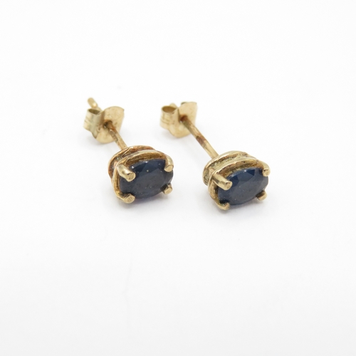 32 - 2 x 9ct Gold Diamond and Sapphire Stud Earrings (1.9g)
