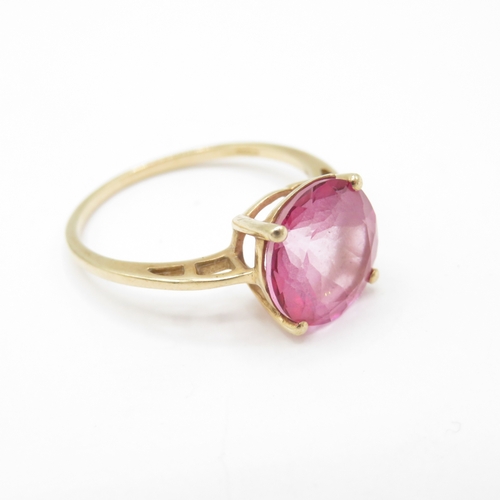 37 - 10ct Gold Pink Topaz Dress Ring - split to gallery rail (2.3g) Size P 1/2