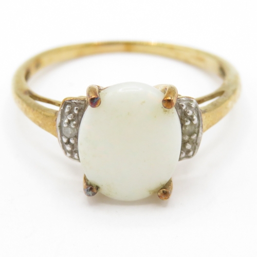 39 - 9ct Gold Opal and Diamond Dress Ring (2g) Size R