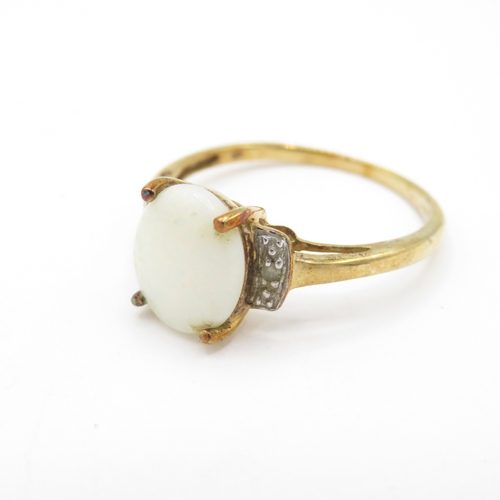 39 - 9ct Gold Opal and Diamond Dress Ring (2g) Size R