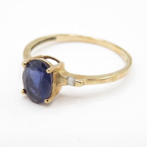 43 - 9ct Gold Iolite and Diamond Claw Set Ring (1.6g) Size S