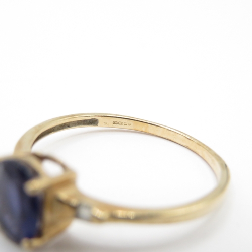 43 - 9ct Gold Iolite and Diamond Claw Set Ring (1.6g) Size S