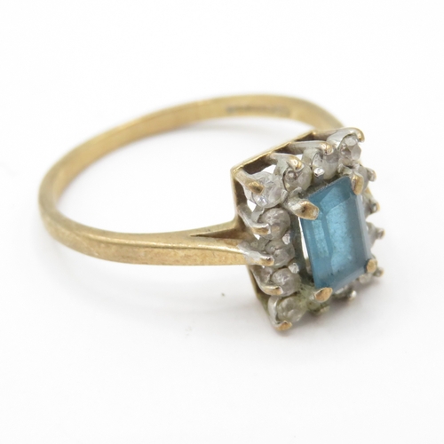 55 - 9ct Gold Topaz and CZ Halo Ring (2.2g) Size P 1/2
