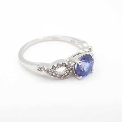 60 - 9ct Gold Tanzanite and White Zircon Claw Set Ring (2.6g) Size N 1/2