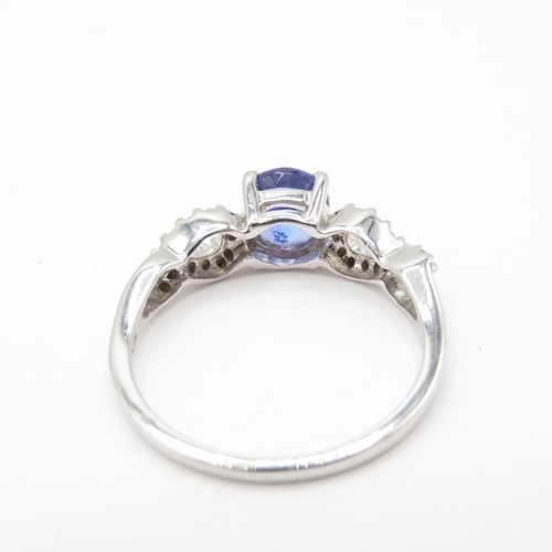 60 - 9ct Gold Tanzanite and White Zircon Claw Set Ring (2.6g) Size N 1/2