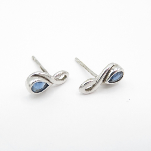 24 - 2 x 9ct White Gold Black Diamond & Sapphire Stud Earrings (1.8g)
