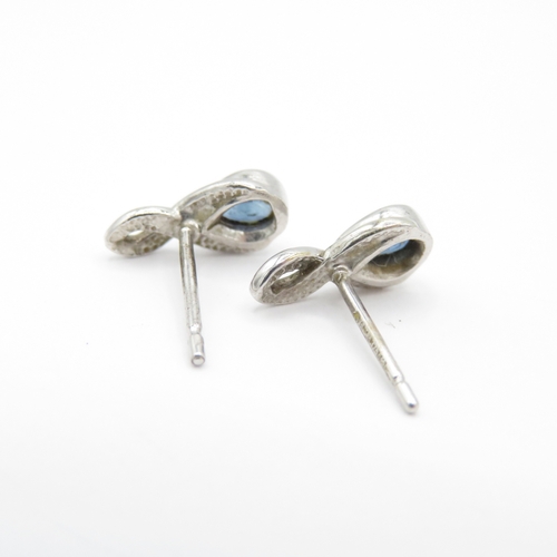 24 - 2 x 9ct White Gold Black Diamond & Sapphire Stud Earrings (1.8g)