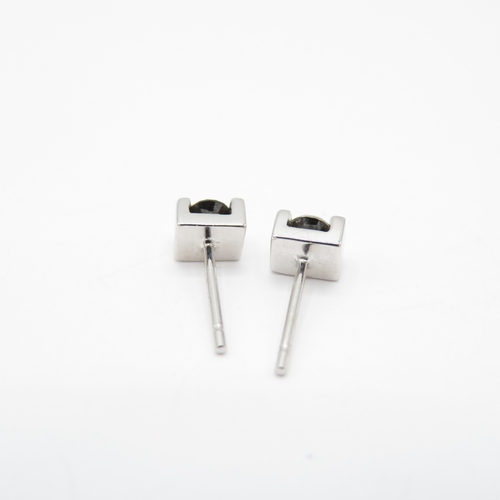 24 - 2 x 9ct White Gold Black Diamond & Sapphire Stud Earrings (1.8g)