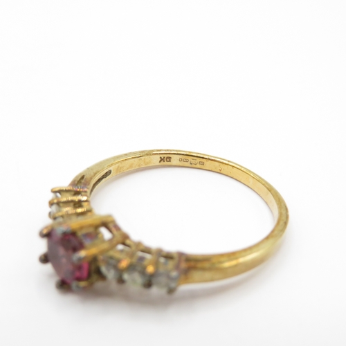 27 - 9ct Gold Garnet and White Topaz Dress Ring (2.1g) Size N
