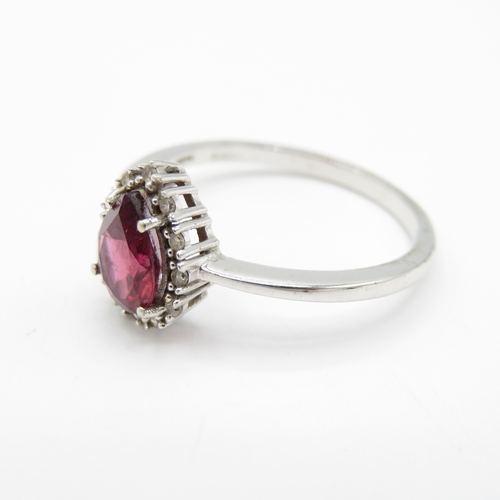 35 - 9ct White Gold Garnet and Diamond Halo Ring (2.8g) Size S