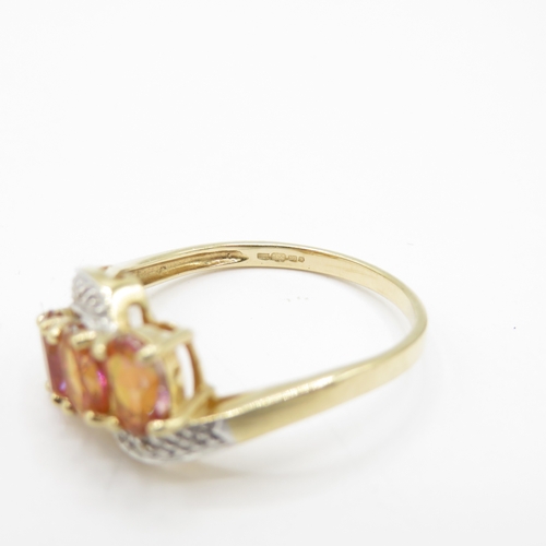 37 - 9ct Gold Mystic Topaz and Diamond Bypass Ring (2.5g) Size P