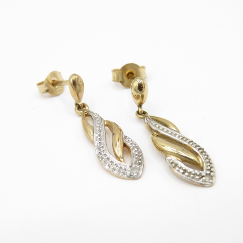 6 - 2 x 9ct Gold Diamond Earrings (4.3g)