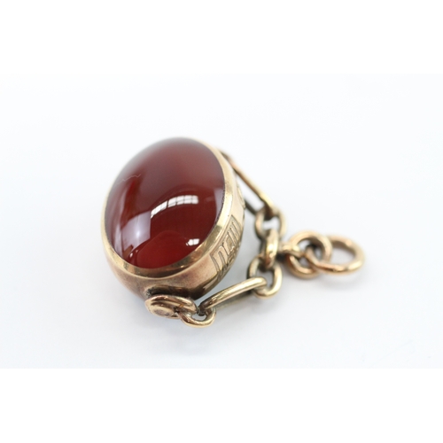20 - 9ct gold malachite carnelian swivel fob (13g)