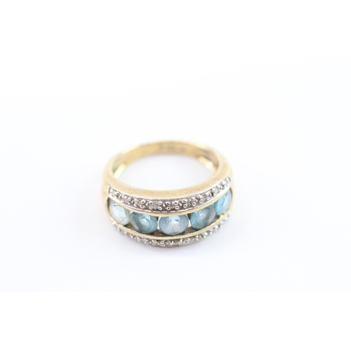 21 - 9ct gold blue topaz & diamond dress ring (2.8g) Size I
