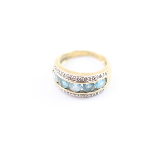 21 - 9ct gold blue topaz & diamond dress ring (2.8g) Size I