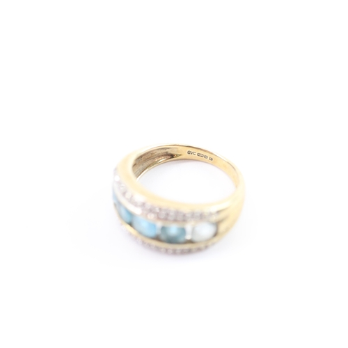 21 - 9ct gold blue topaz & diamond dress ring (2.8g) Size I