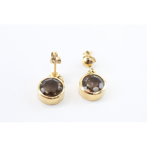 24 - 9ct gold smokey quartz drop earrings (3g)