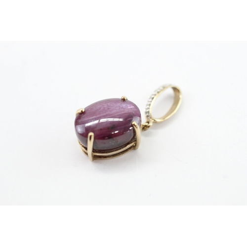 37 - 9ct gold star ruby diamond pendant (4.1g)