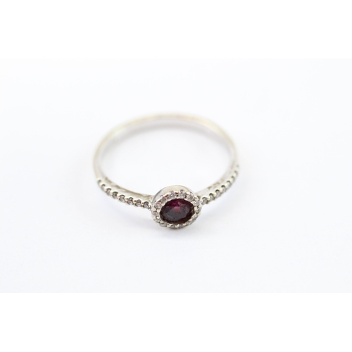 43 - 14ct white gold ruby diamond halo cluster ring (1.9g) Size M 1/2