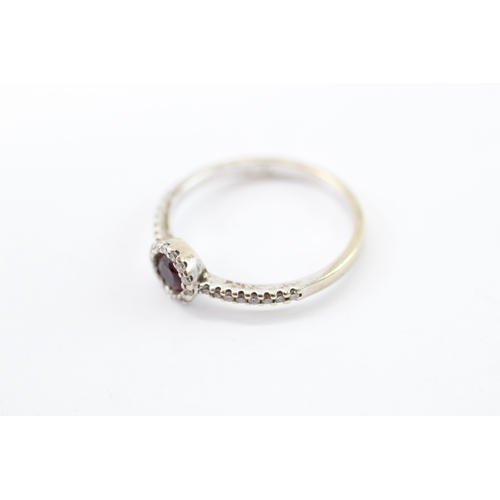 43 - 14ct white gold ruby diamond halo cluster ring (1.9g) Size M 1/2