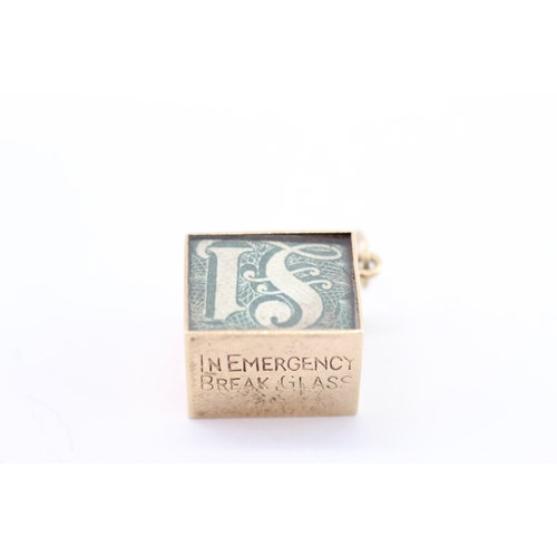 55 - 9ct gold vintage money charm (3g)