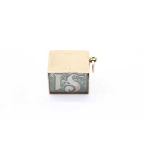 55 - 9ct gold vintage money charm (3g)