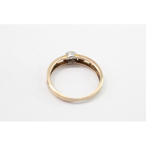58 - 9ct gold diamond solitaire ring (1.4g) Size L