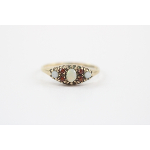 11 - 9ct gold opal garnet boat ring (1.3g) Size N