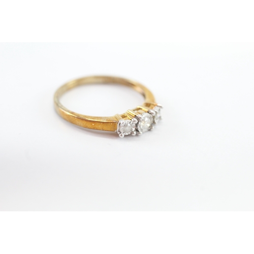 19 - 9ct gold diamond three stone ring (2.4g) Size P