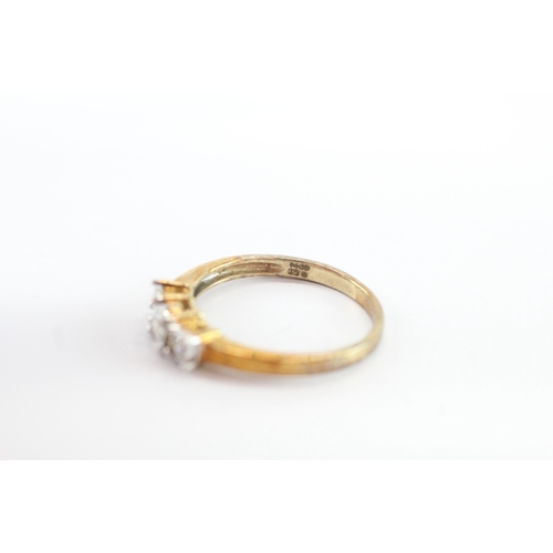 19 - 9ct gold diamond three stone ring (2.4g) Size P