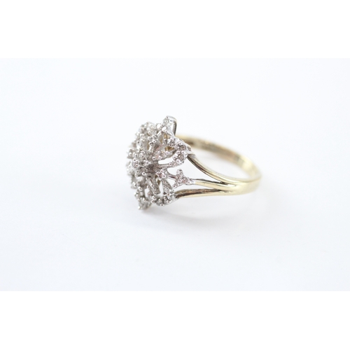35 - 9ct gold diamond floral ring (2.8g) Size N 1/2