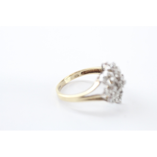35 - 9ct gold diamond floral ring (2.8g) Size N 1/2