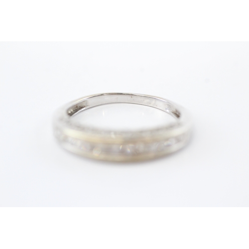 39 - 9ct white gold diamond half eternity ring (4.4g) Size U 1/2