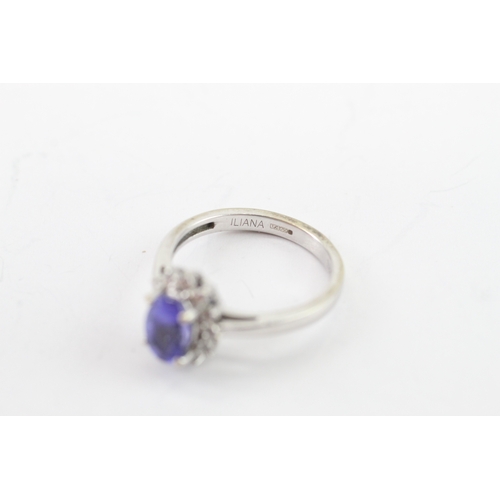 42 - 18ct white gold tanzanite diamond cluster ring (3.8g) Size L 1/2