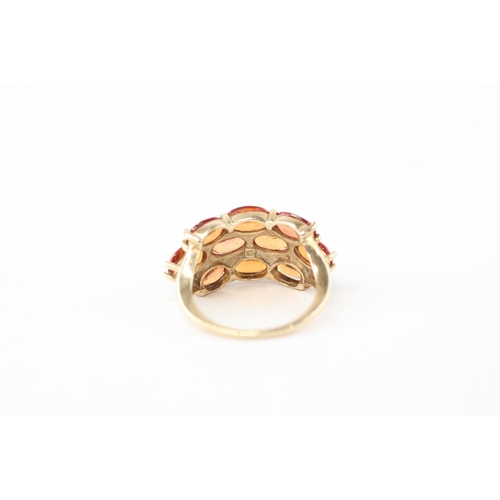 48 - 9ct gold colour enhanced orange sapphire ring (3.5g) Size K