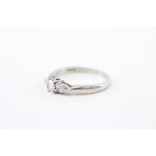 49 - .950 platinum diamond trilogy ring (4.7g) Size O 1/2