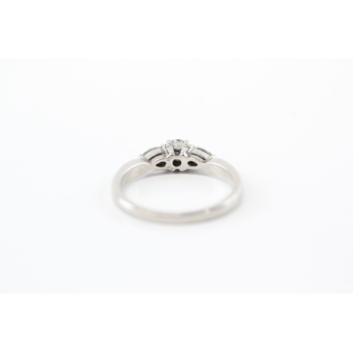 49 - .950 platinum diamond trilogy ring (4.7g) Size O 1/2