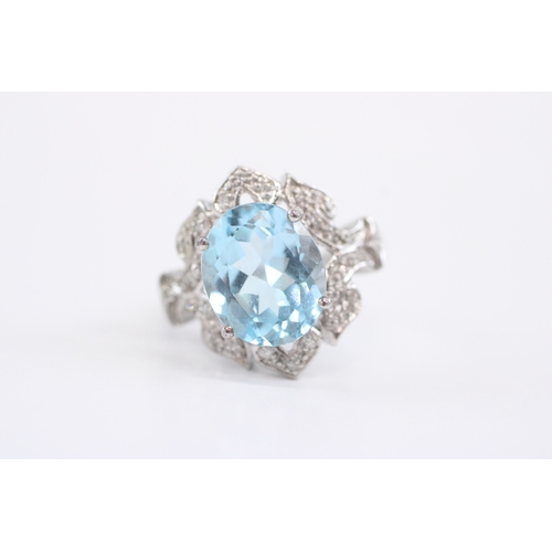 54 - 9ct white gold blue topaz diamond cocktail ring (5.1g) Size N