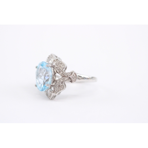 54 - 9ct white gold blue topaz diamond cocktail ring (5.1g) Size N