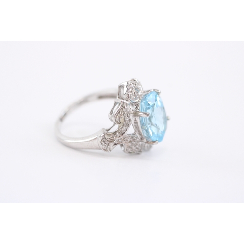 54 - 9ct white gold blue topaz diamond cocktail ring (5.1g) Size N