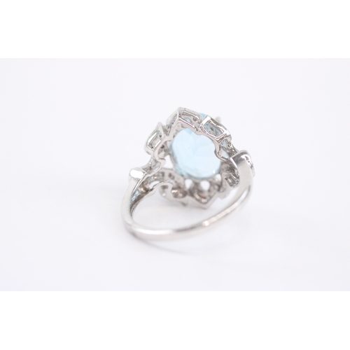 54 - 9ct white gold blue topaz diamond cocktail ring (5.1g) Size N