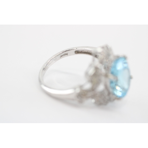 54 - 9ct white gold blue topaz diamond cocktail ring (5.1g) Size N
